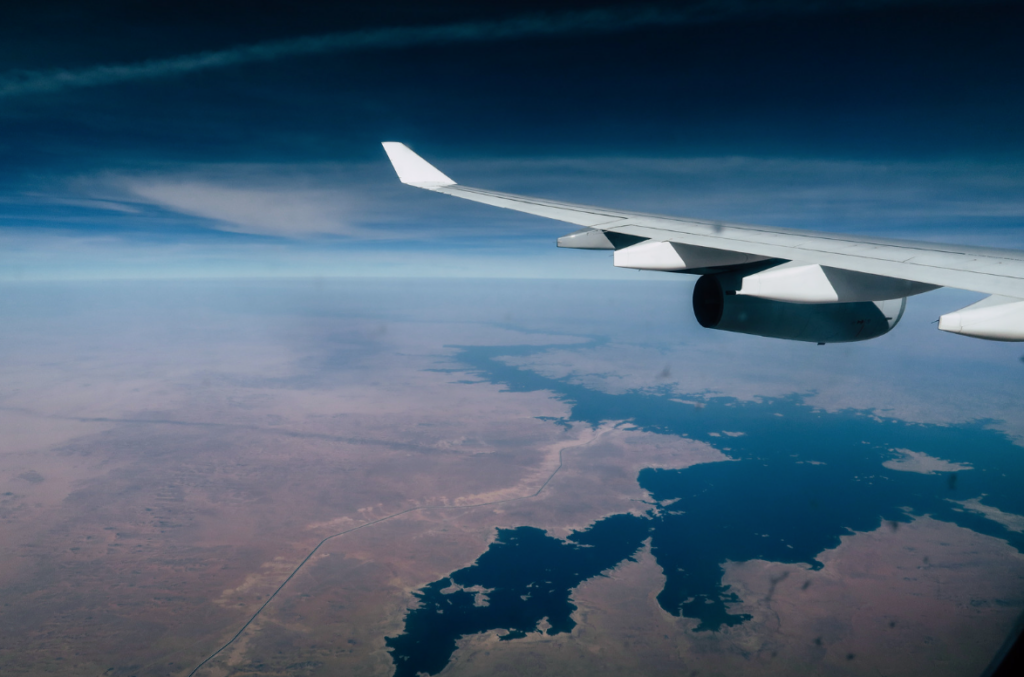 This picture shows an airplane (from the inside) flying over Nil river in Africa. This picture was taken by Nicole Silvestri